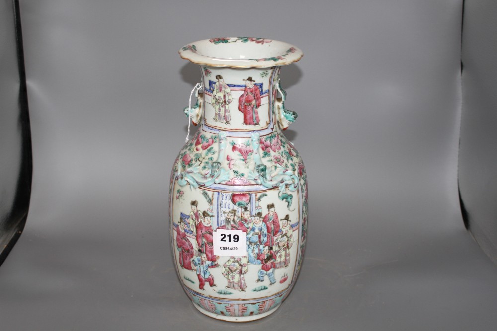 A 19th Chinese famille rose vase, decorated with panels of noblemen and attendants, height 35cm